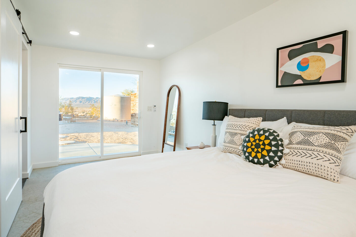 After — the raw garage interior, now an ADU bedroom